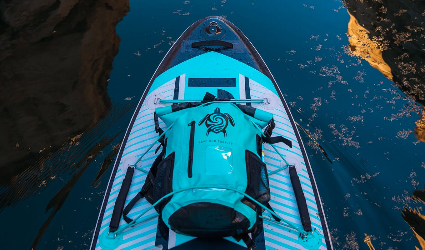GILI Air paddle board with blue dry bag